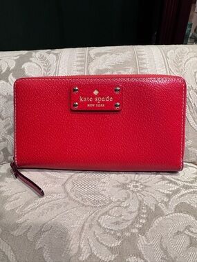 kate spade Red Pebbled Leather Zip Wallet with Gold Logo Plate